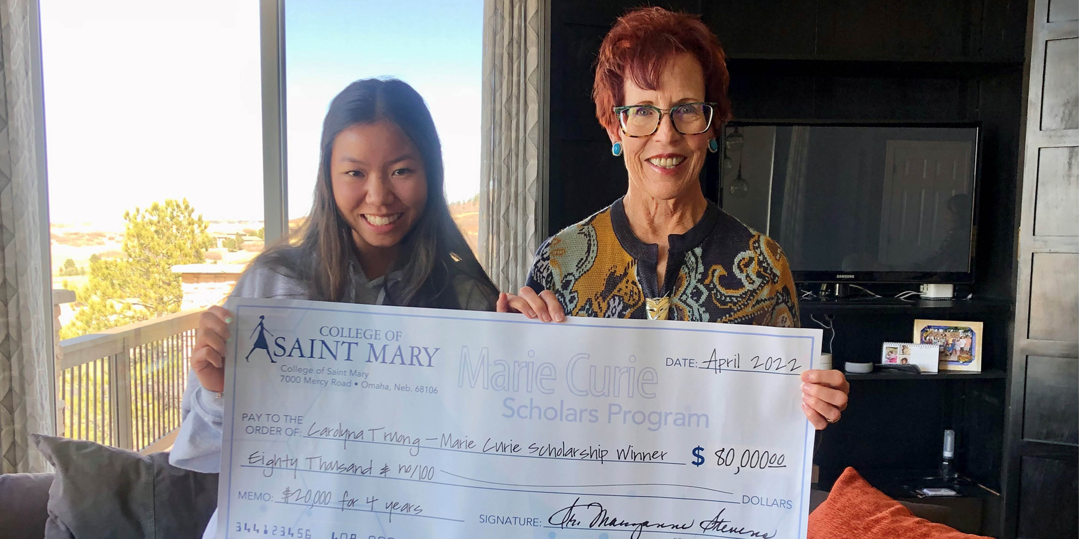 Alums present Marie Curie scholarship to 2 students College of Saint Mary